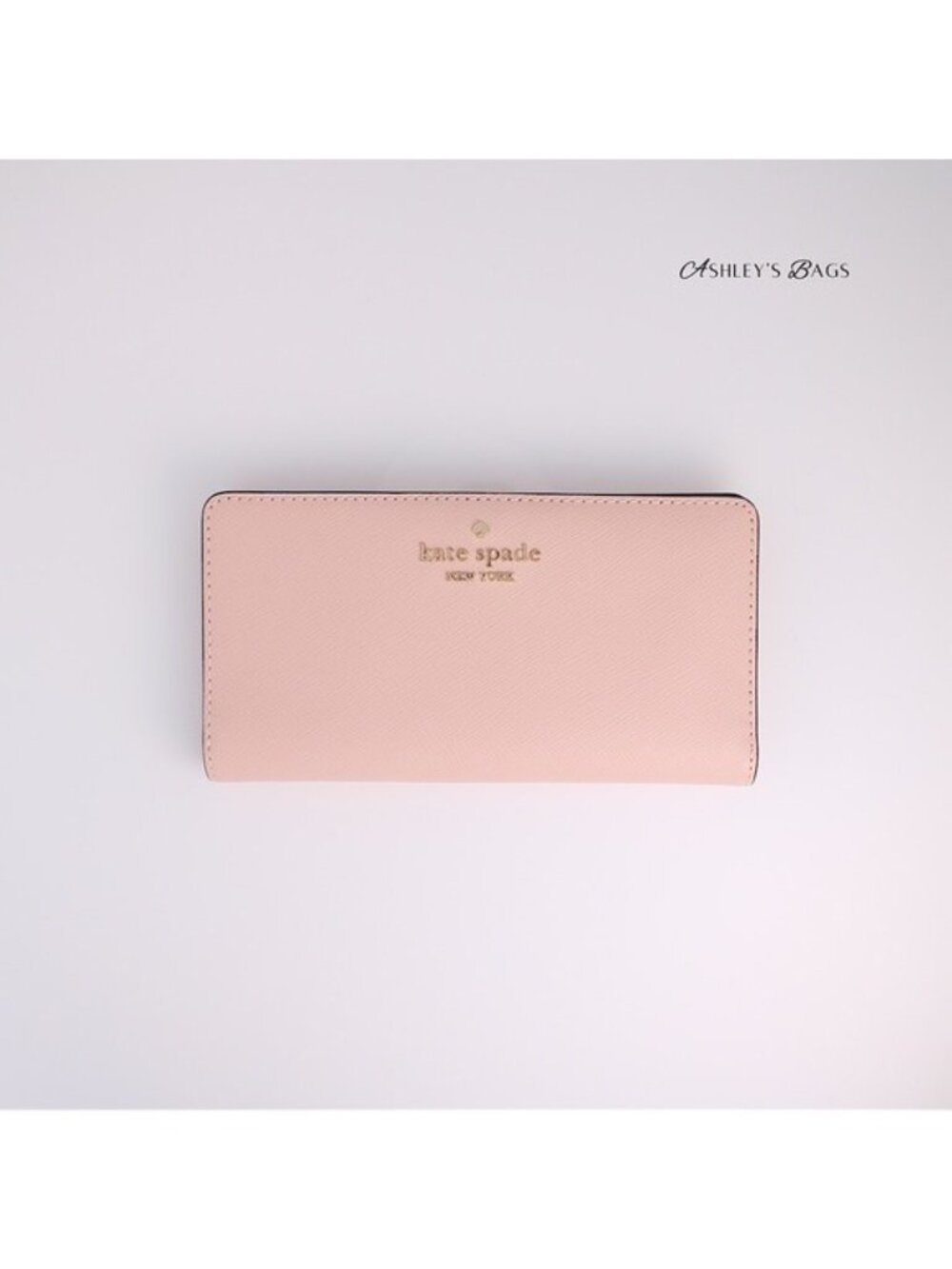 Kate Spade Madison Large Slim Bifold Wallet In Conch Pink